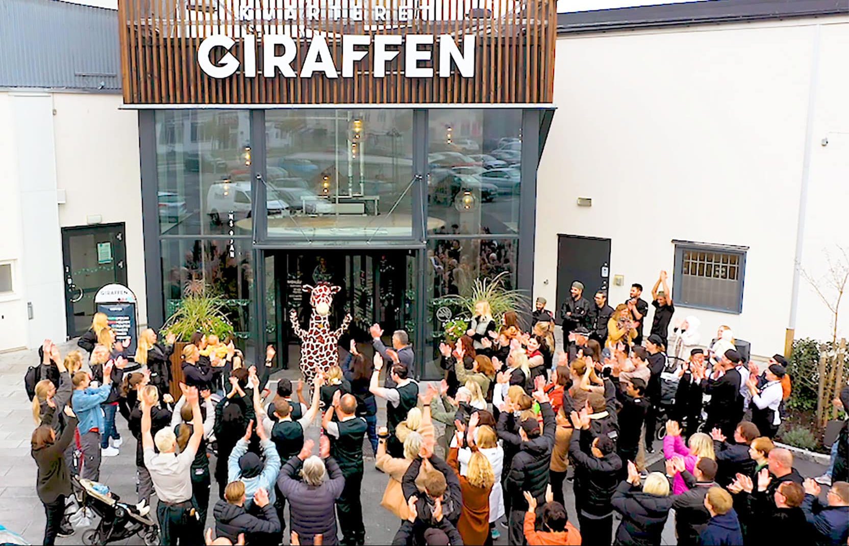 happy people outside a shopping mall